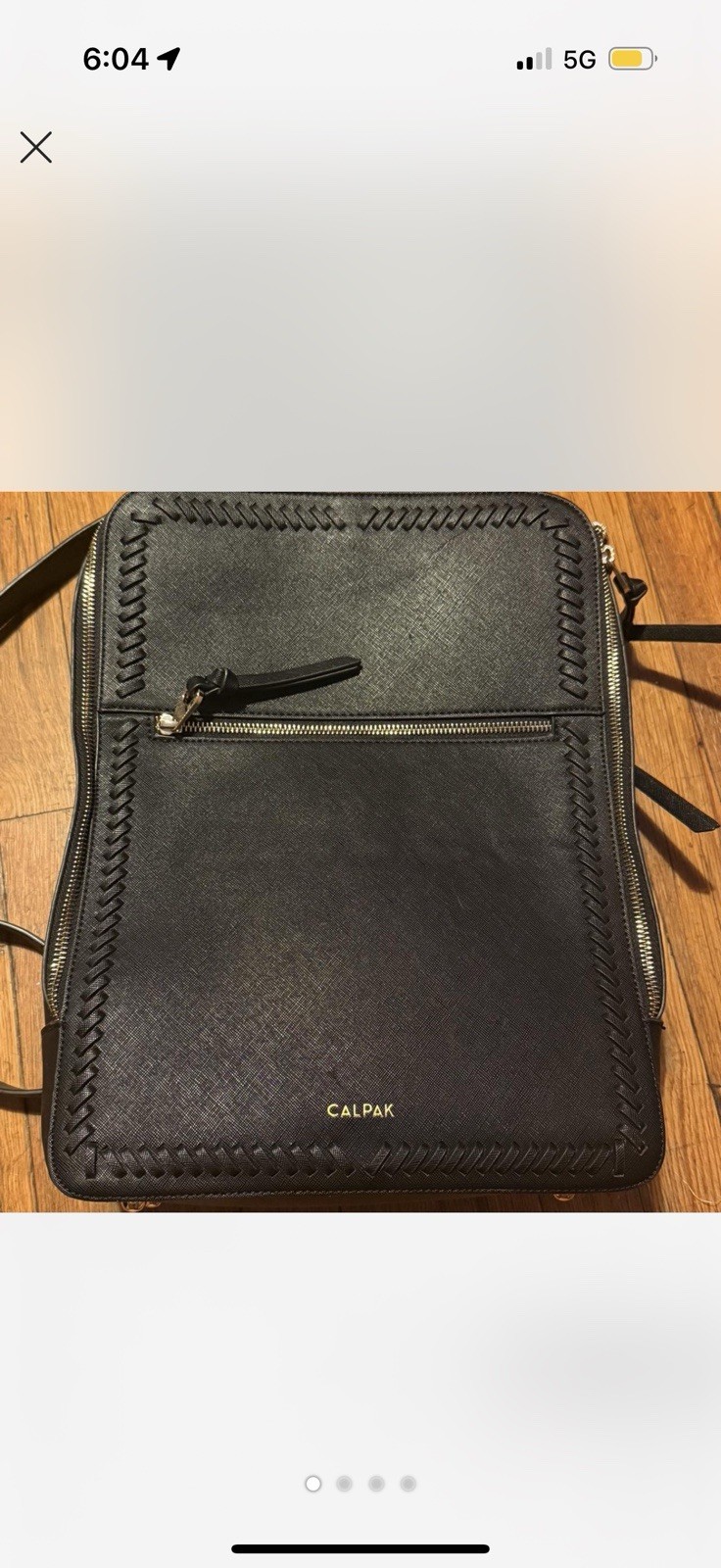 Calpak black leather backpack with multiple pockets #leatherbackpack