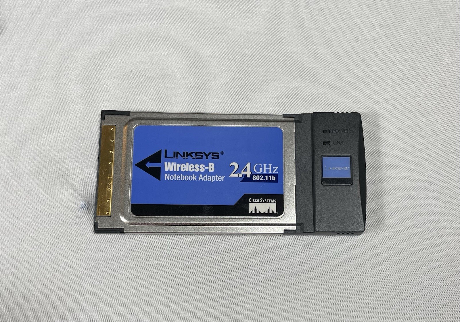 LINKSYS WIRELESS-G 2.4 GHz 802.11 NOTEBOOK ADAPTER w/SPEED BOOSTER MODEL#WPC54GS