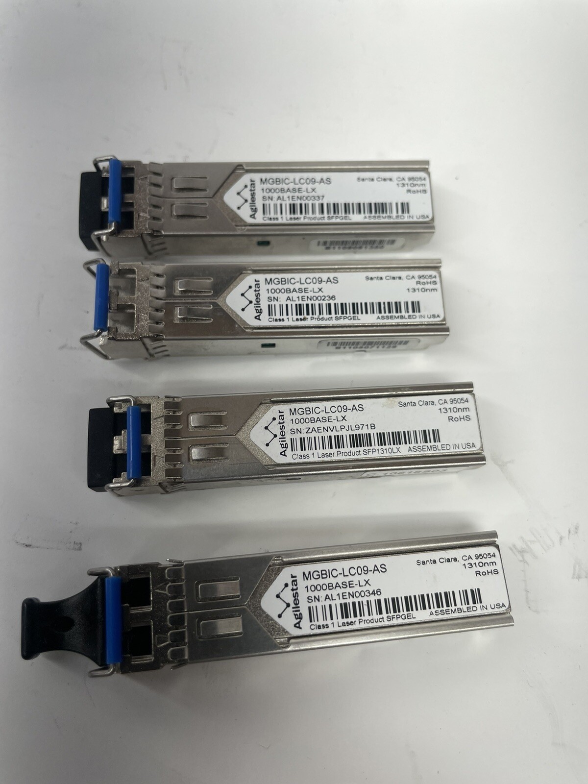 LOT OF 4 AGILESTAR MGBIC-LC09-AS 1000BASE-LX TRANSCEIVER