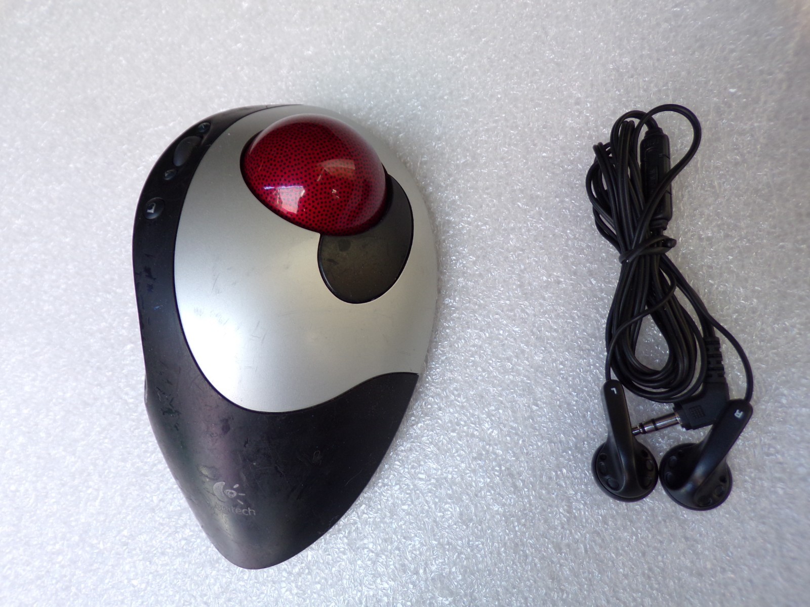 Logitech Cordless Optical Trackman/Trackball T-RB22 Mouse Only + new hp earbud