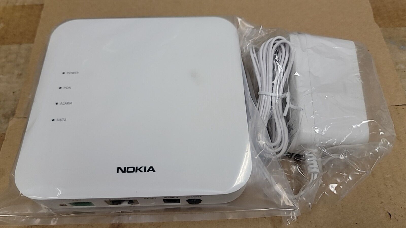 A lot of 10pcs Nokia   XS-010X-Q Optical Network Terminal with AC Power Supply