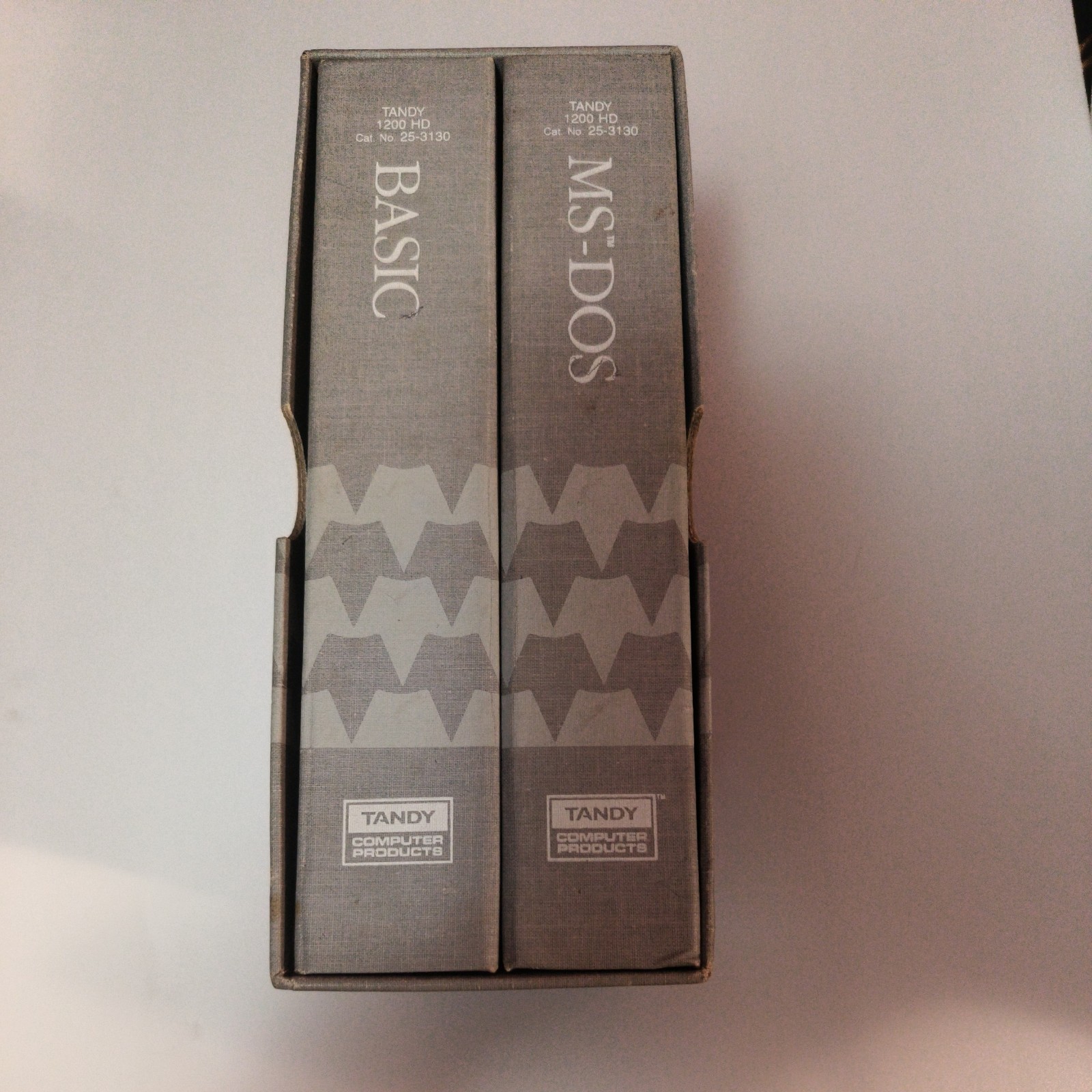 Vintage Tandy 1200 MS-DOS/BASIC floppy disks and manuals in case