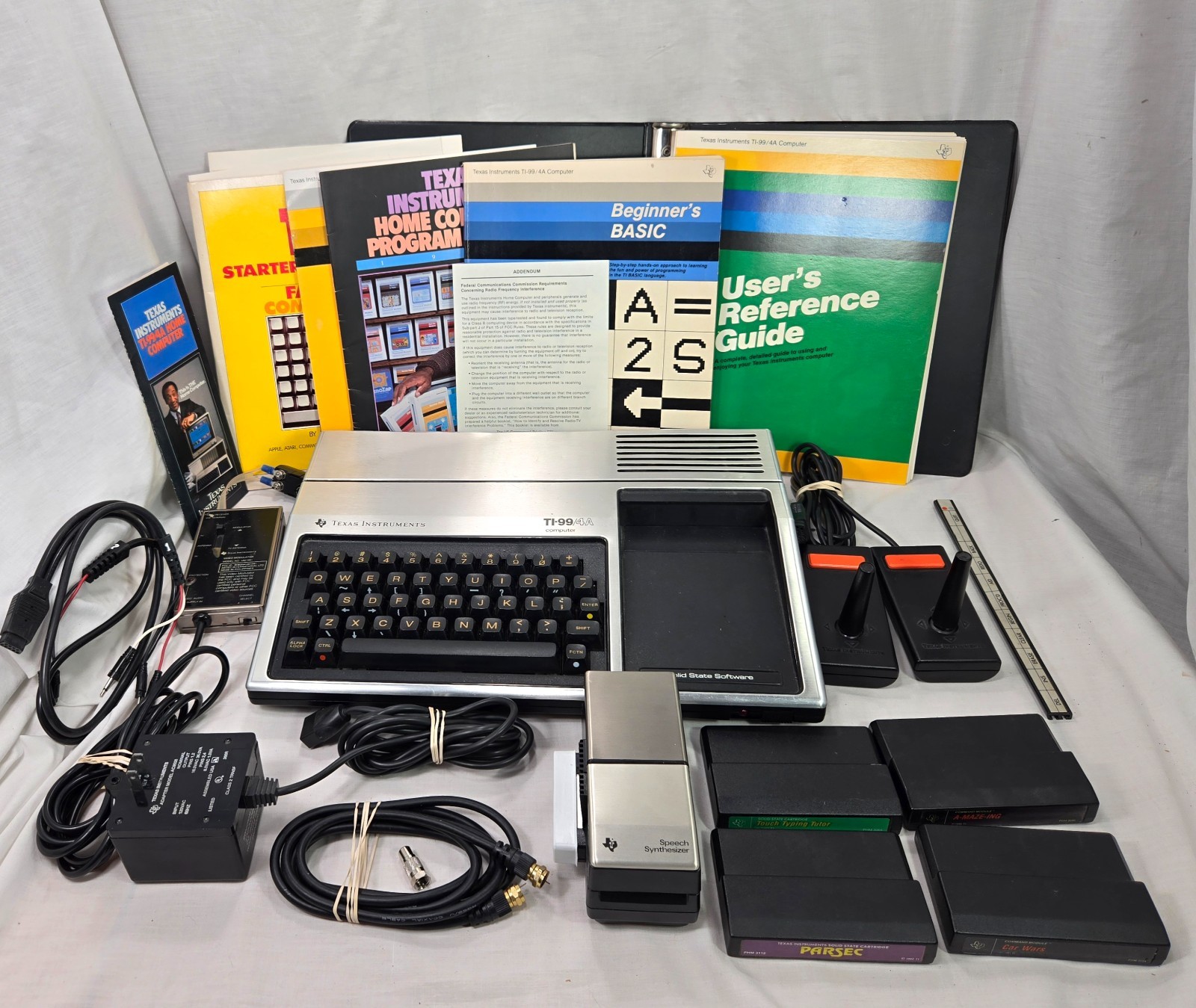 Vtg Texas Instruments TI-99/4A  Computer Bundle with Cables Manuals Games Speech