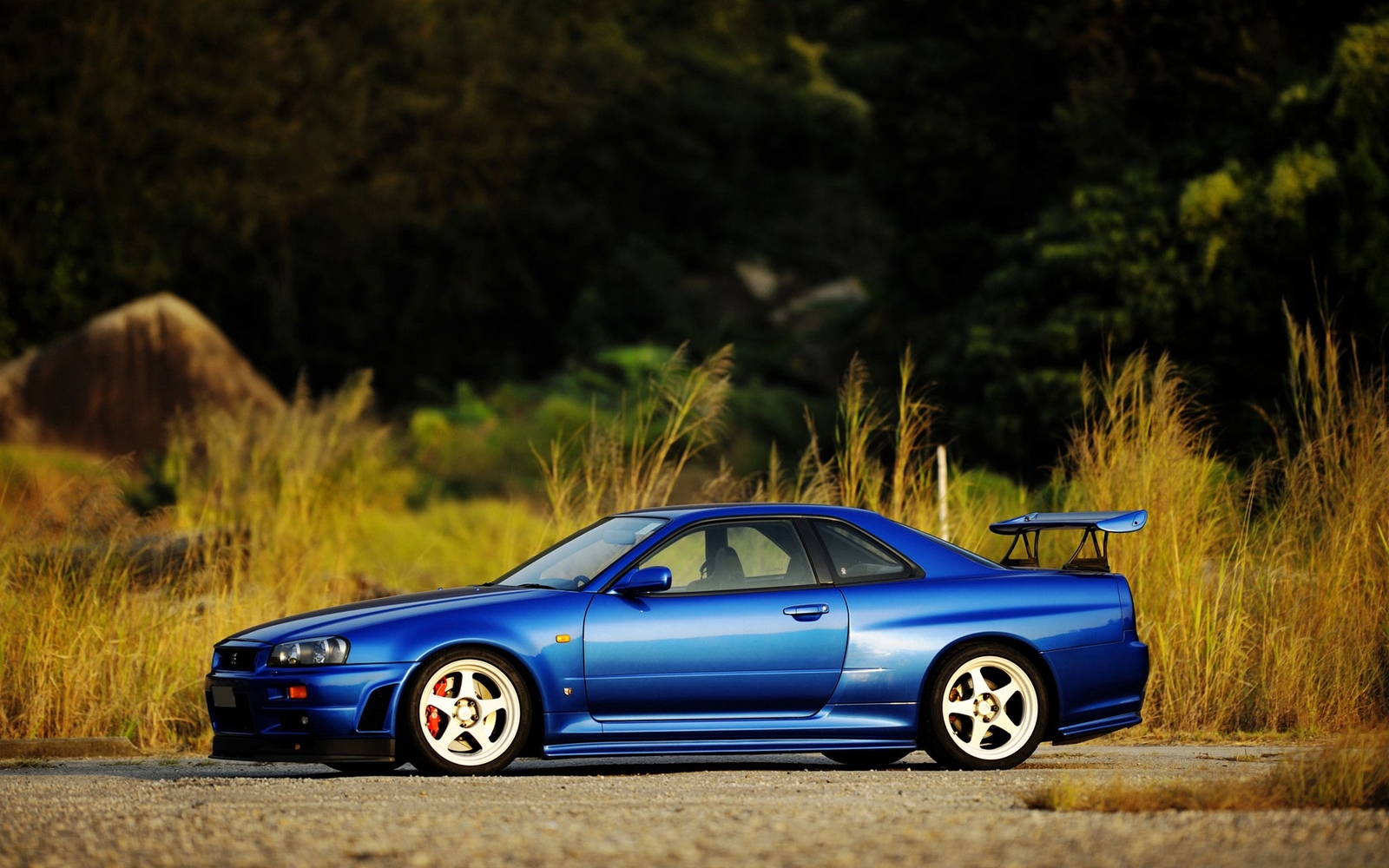 Cars sunset nissan skyline blue r34 midnight Desk Mat Stitched