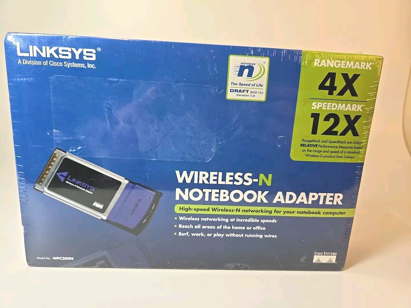 Linksys Wireless-N Notebook Adapter WPC300N Range 4X Speed 12X  *New* Sealed box