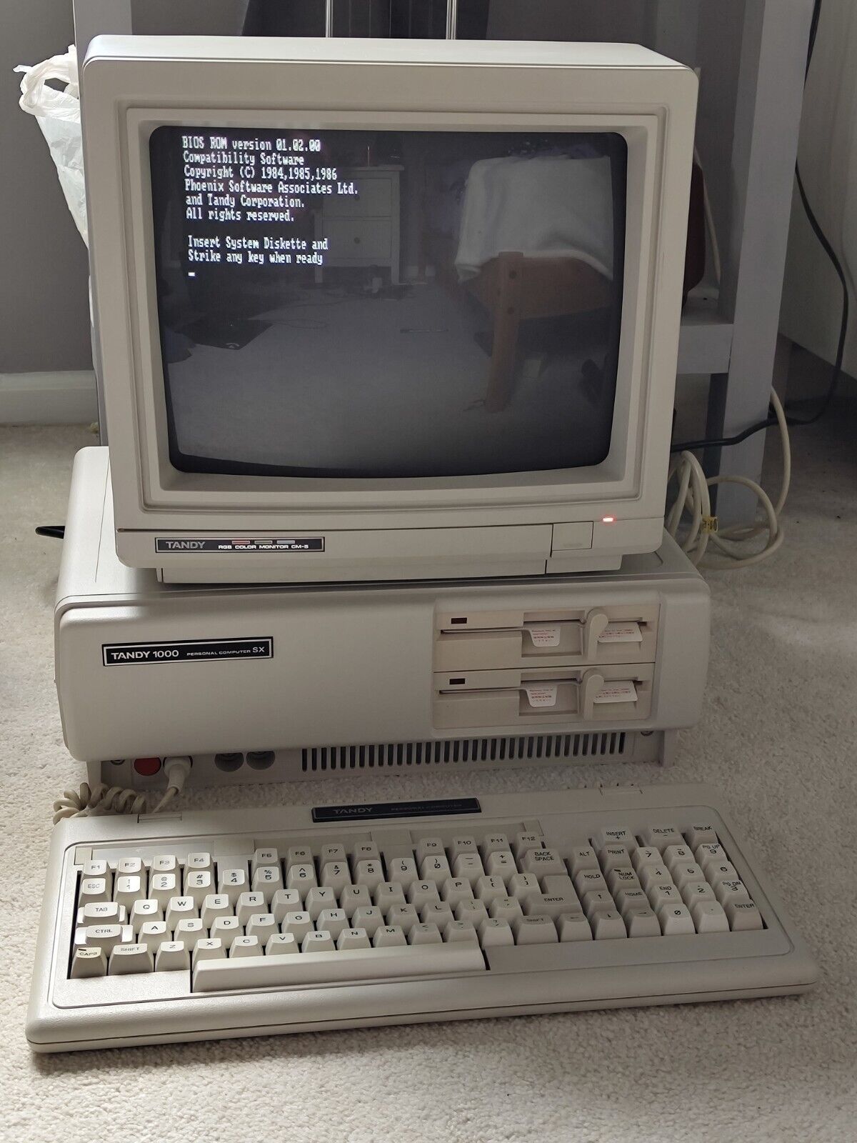 Working Tandy 1000 SX With CM-5 Monitor, Boot Discs, Manuals, And Keyboard
