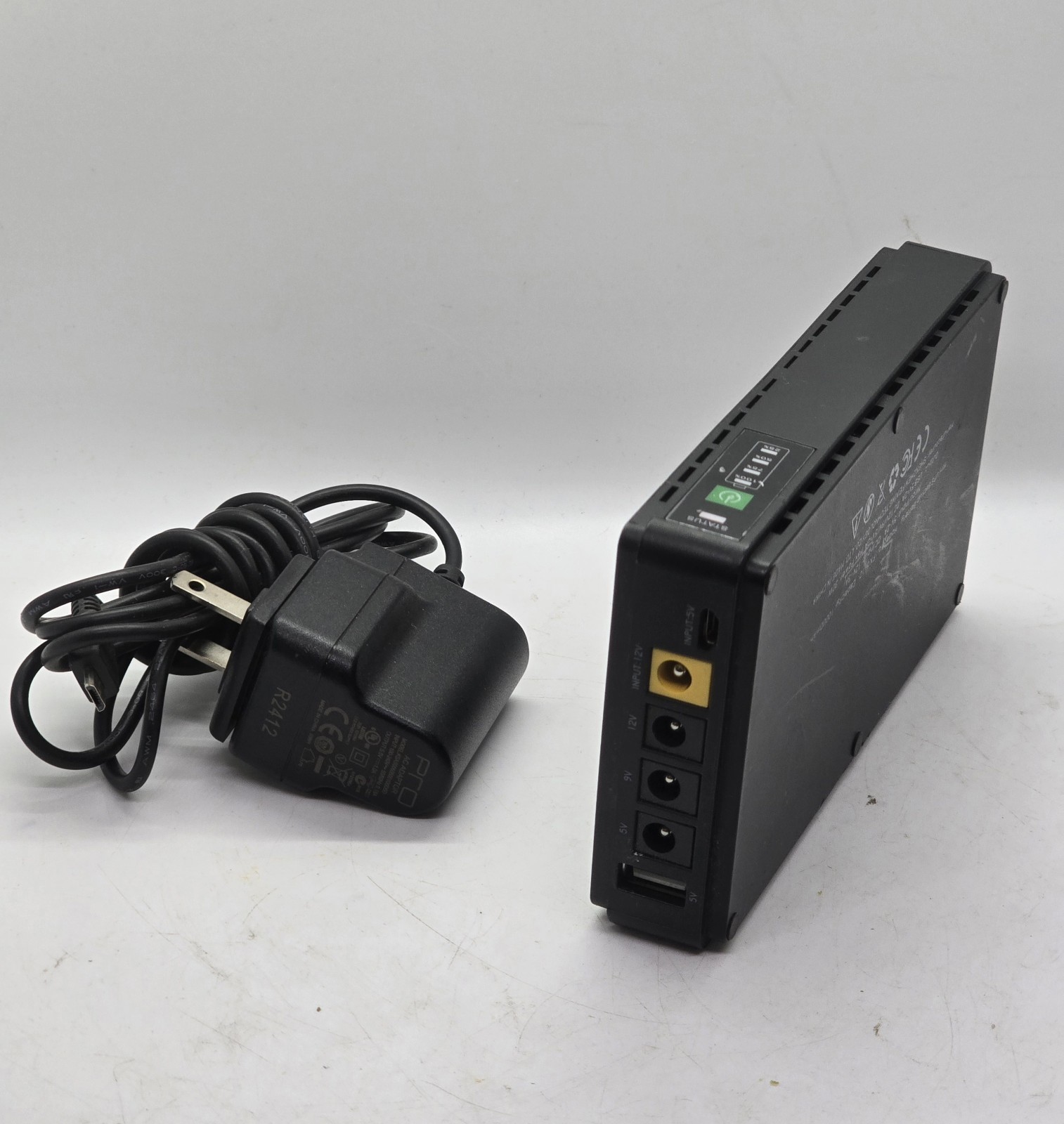 SHANQIU FX5-12  Mini UPS Battery Backup 10000mAh 12V 9V 5V-2A Output 30W 