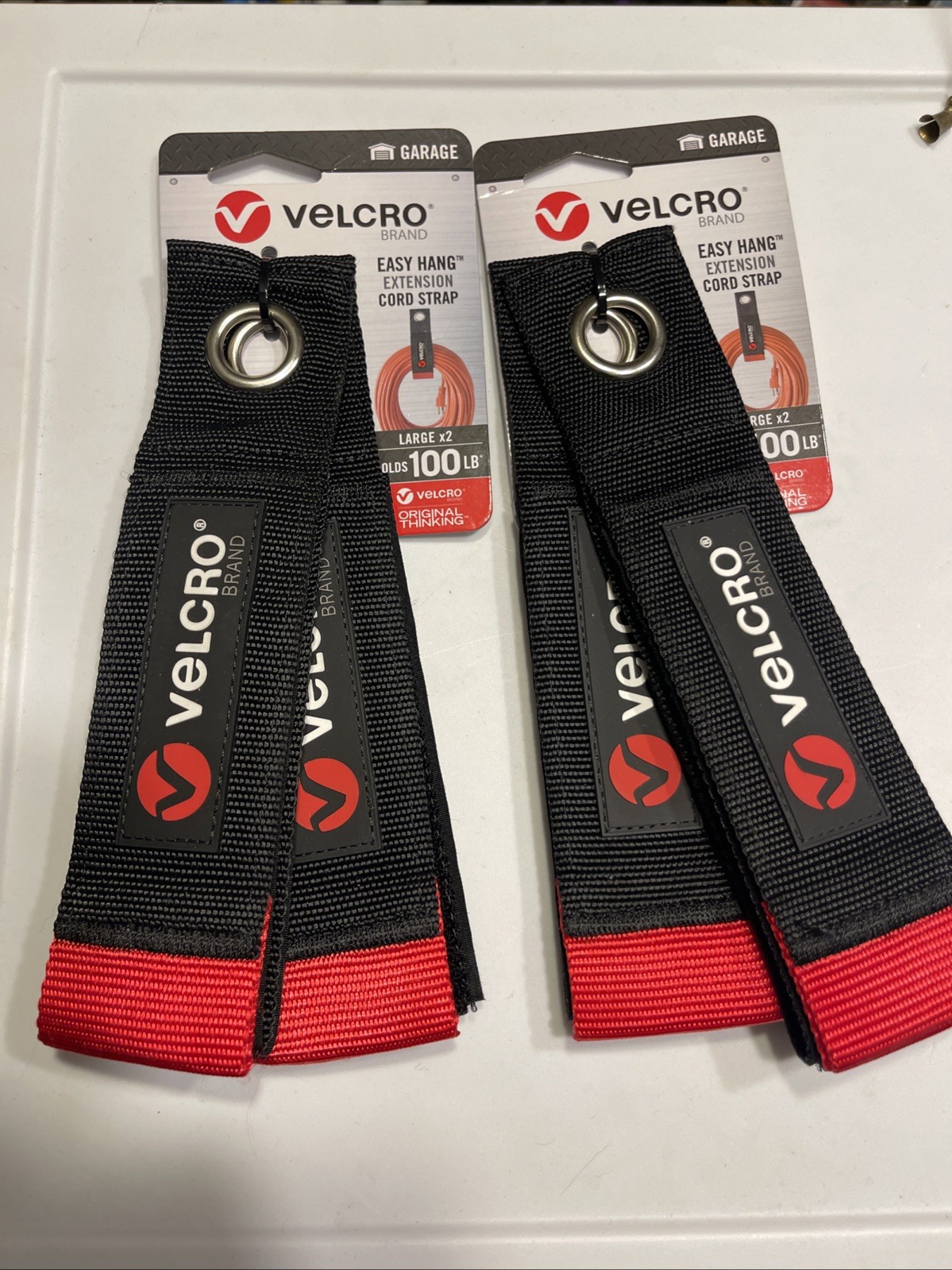 2  2-Packs, Velcro Brand Heavy Duty Easy Hang Organizer holds up to 100 pounds. 