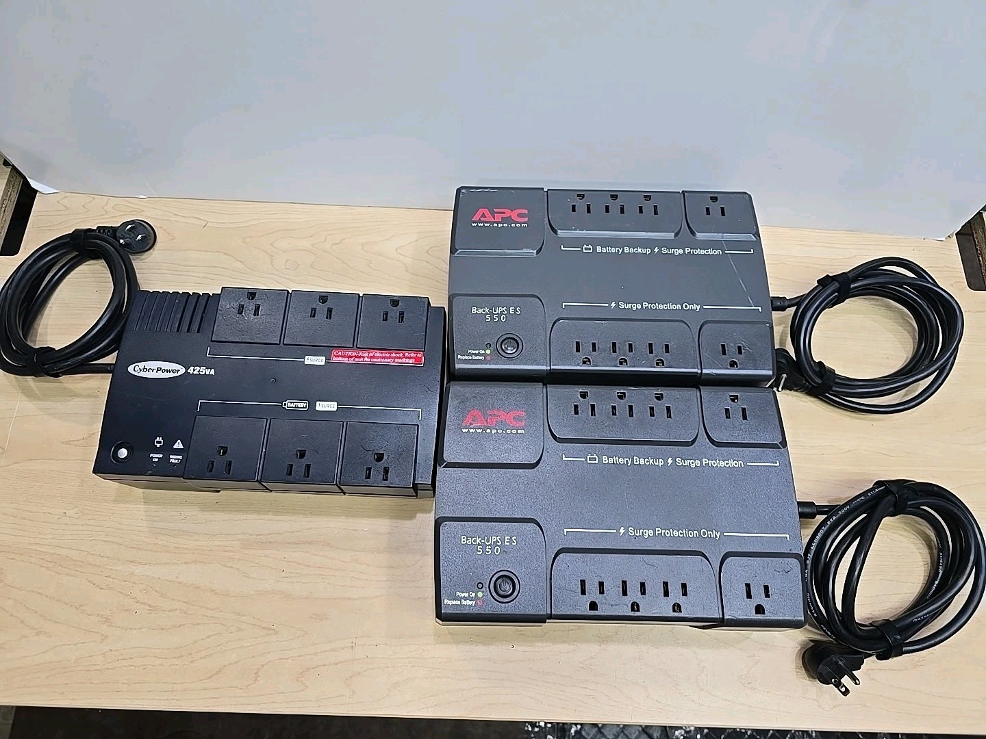 2 APC Back-UPS 550 BE550R 8-Outlet + CyberPower 425 Uniterruptible Power Supply