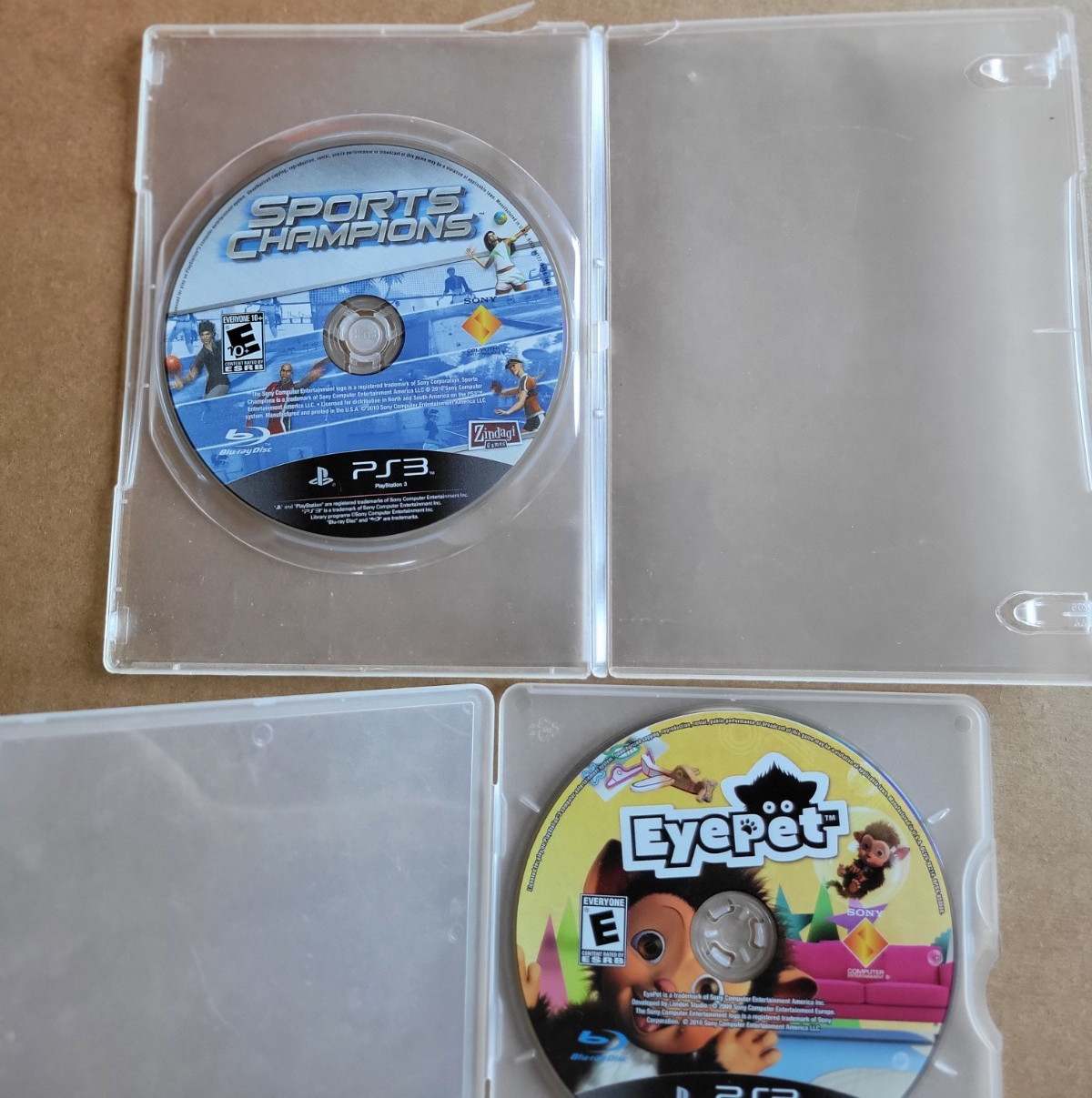 PS3 Eyepet and Sports Champions game bundle