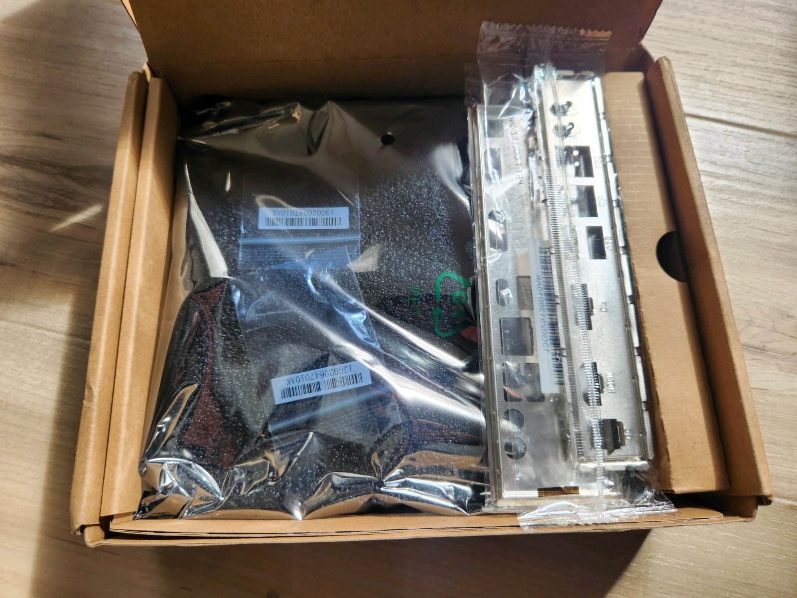 (Bundle) ASRock X600TM-ITX AM5 Motherboard w/ 19mm Low-Profile Cooler