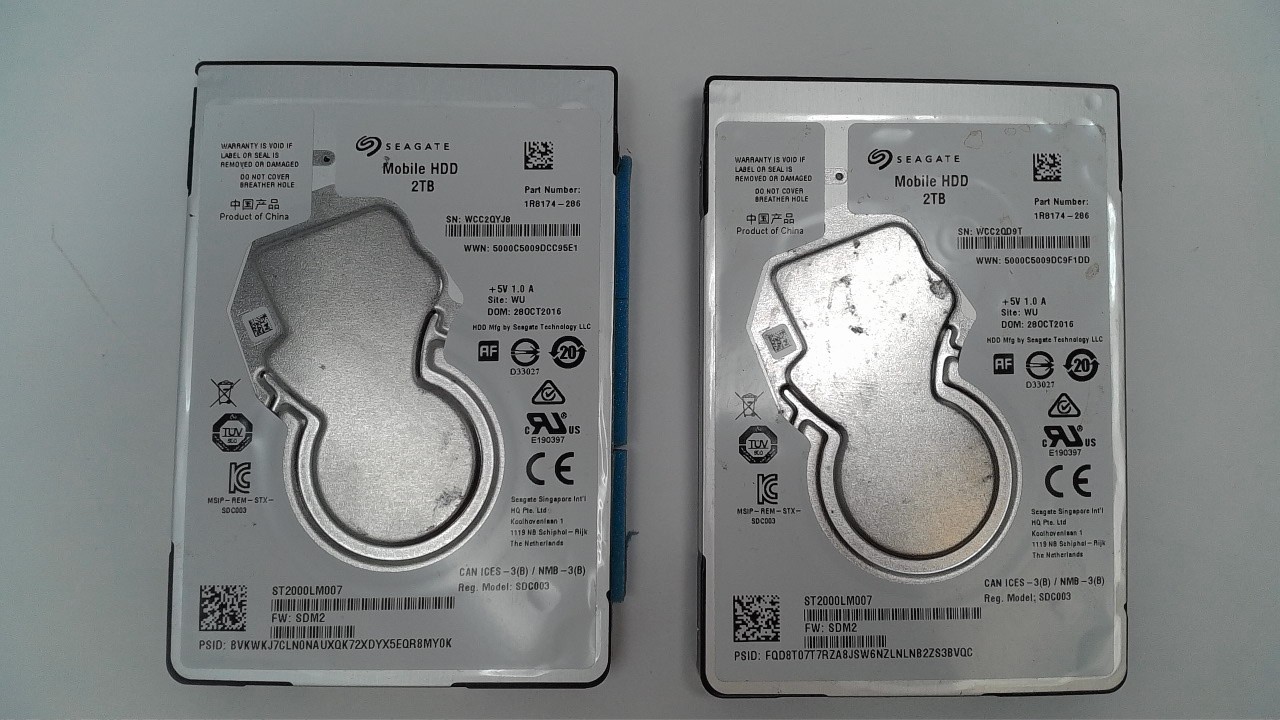 Lot of 2 Seagate Mobile HDD ST2000LM007 2TB 2.5in SATA 5400RPM 128MB 7mm