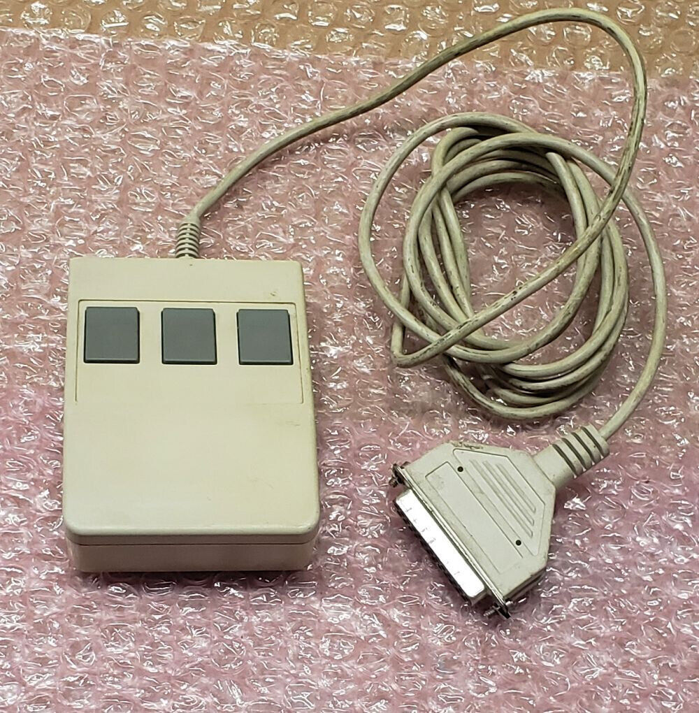 Logitech C7-3F-25F 3-button beige DB25 serial mouse, vintage mid 1980s