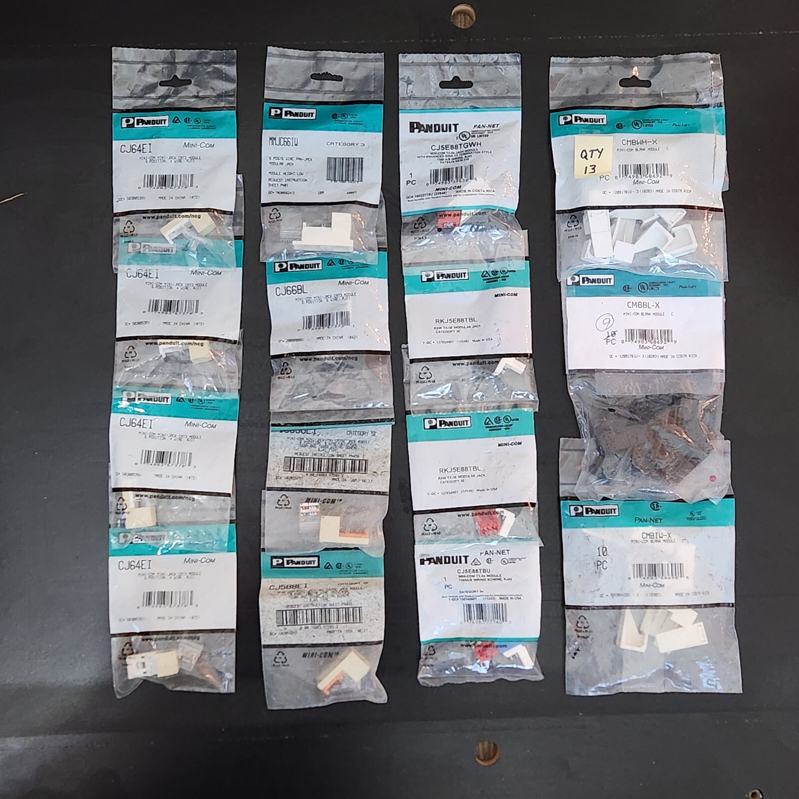 REDUCED Lot of 44 Panduit Parts * (12) Cat5e & Cat3 Jack Modules & (32) Blanks