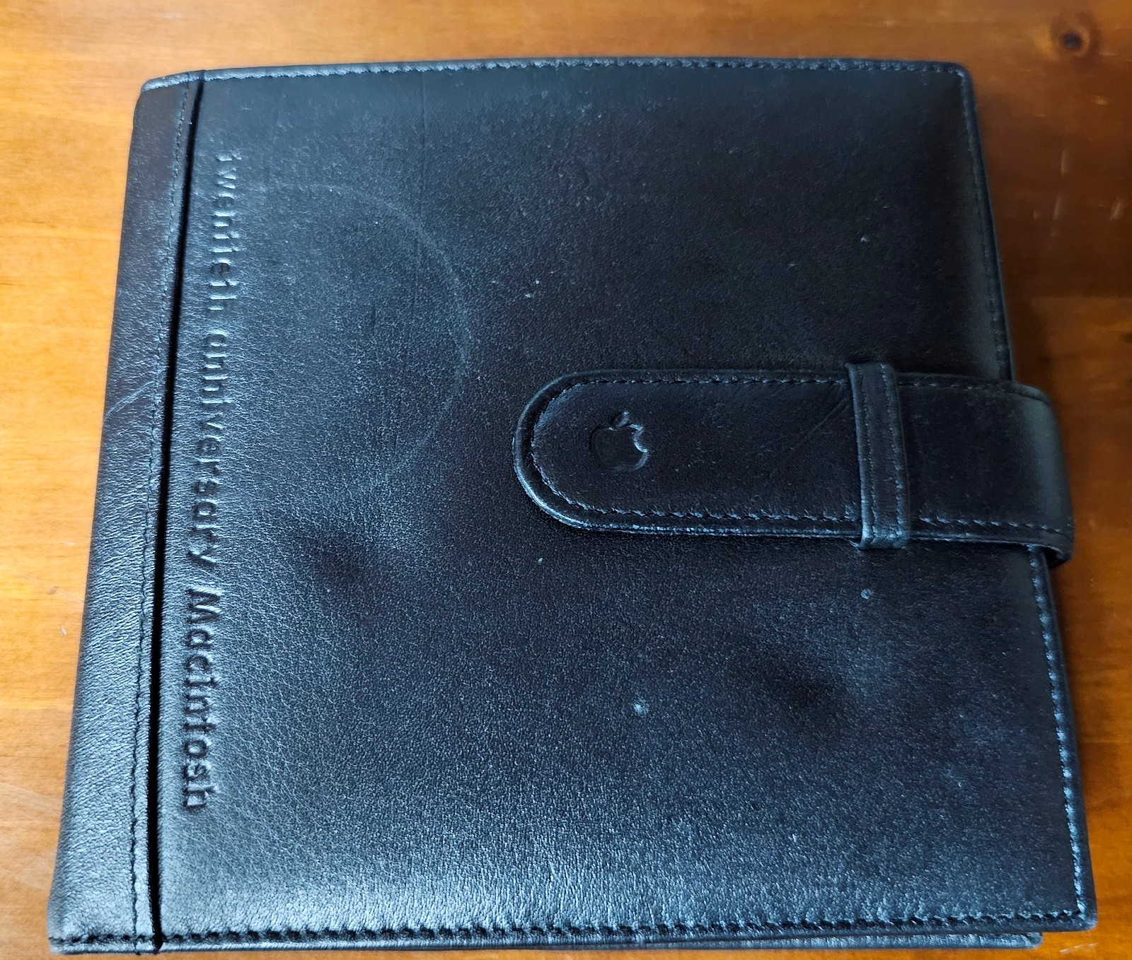Vintage Apple Twentieth Anniversary Macintosh leather CD wallet with CDs