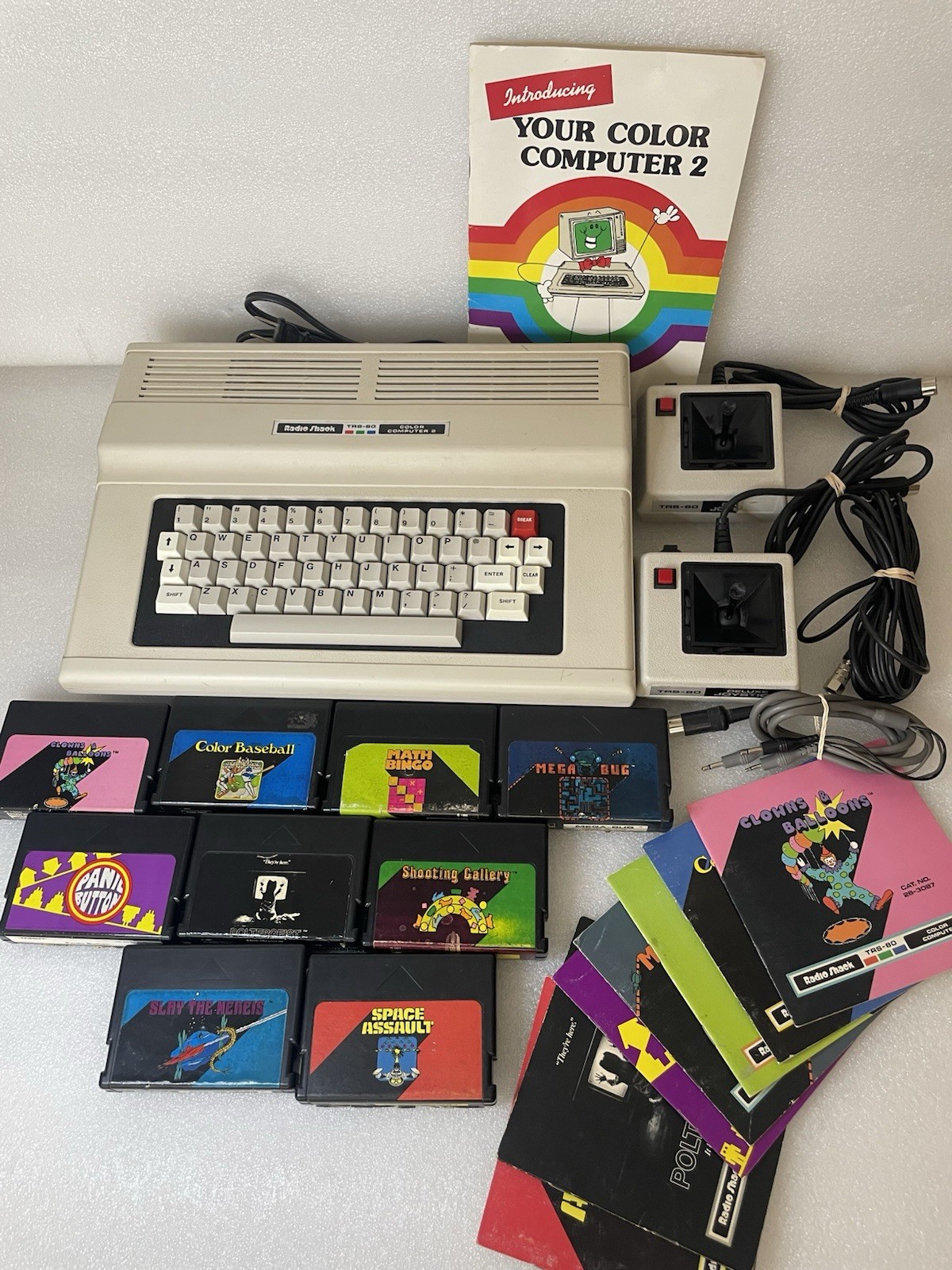 TRS‑80 Color Computer 2 (CoCo2) Radio Shack, (2) Joysticks & (9) Games - Works