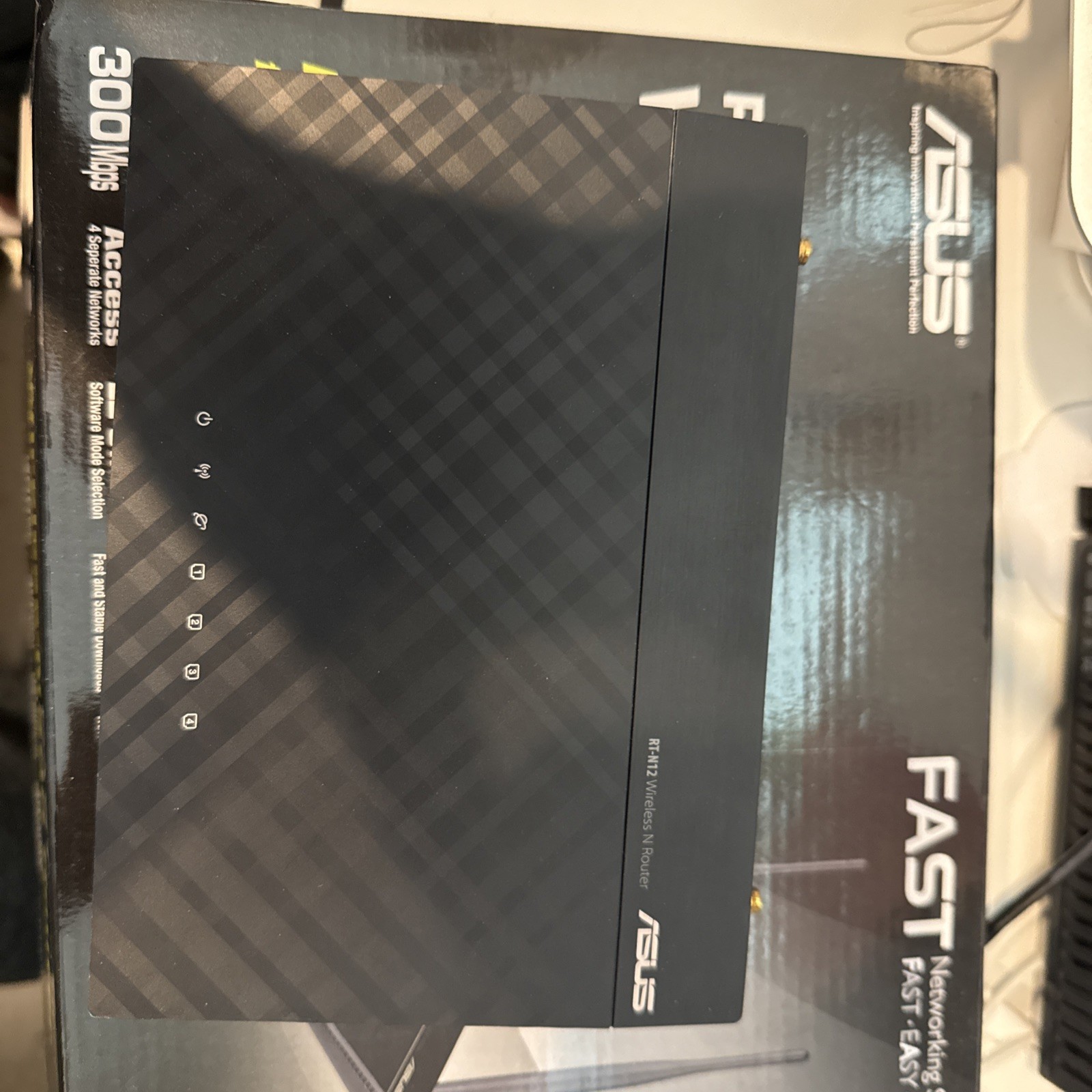 ASUS RT-N12 4-Port 10/100 Wireless N Router (RT-N12 B1)