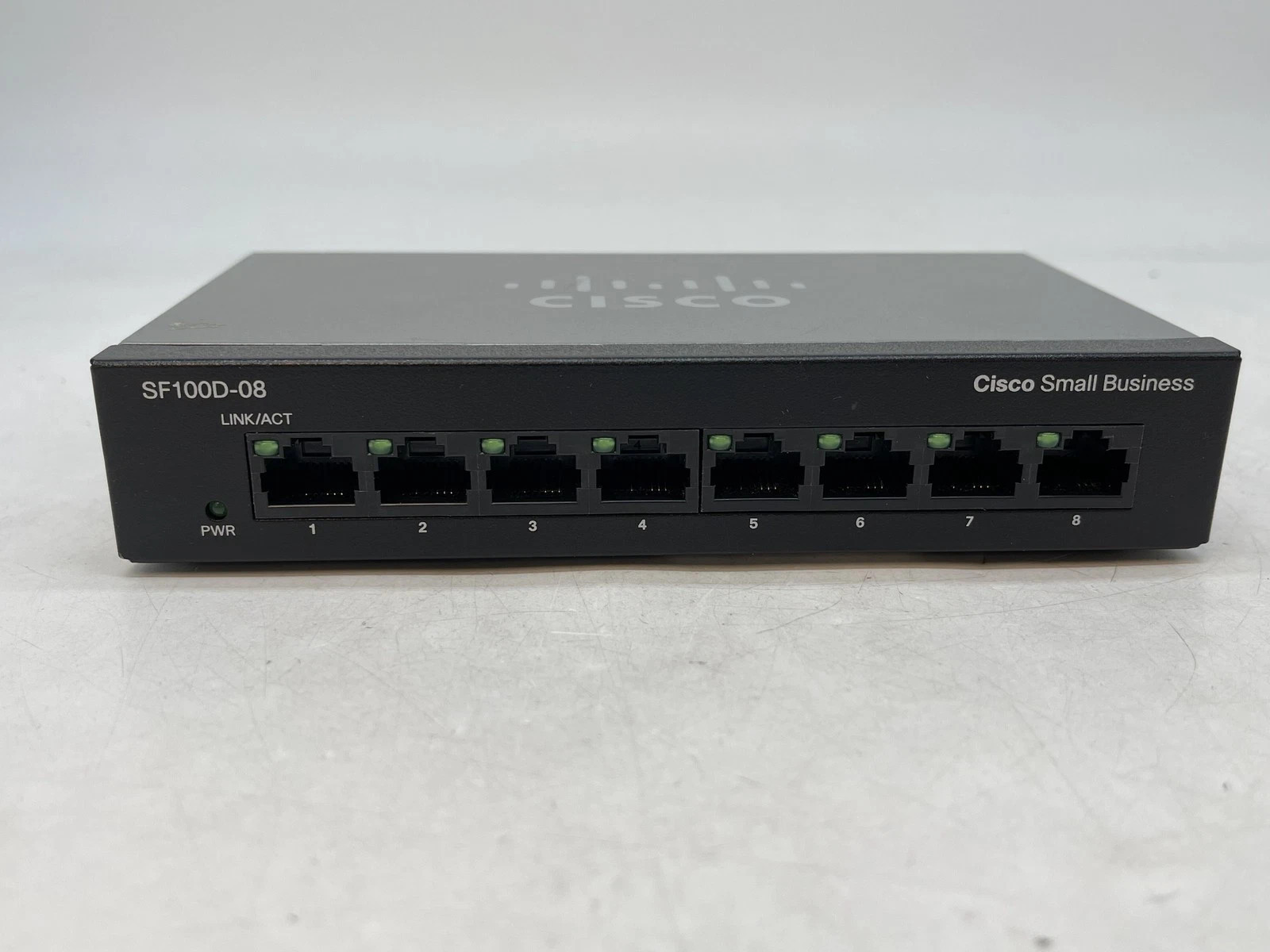 Cisco SF100D-08 V2 8-Port Desktop 10/100 Network Switch with Power Adapter Cord