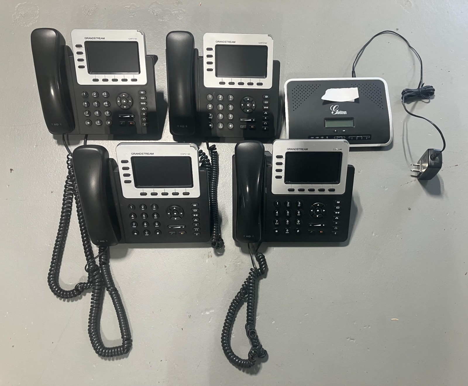 Grandstream IP (4) GXP2140 Phones and (1) UCM 6104 PBX 