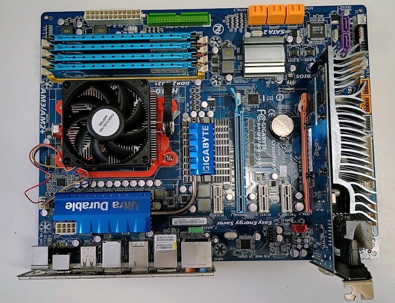 GIGABYTE GA-MA790X-UD4P ATX motherboard with 8GB ram, AMD CPU, Asus video card
