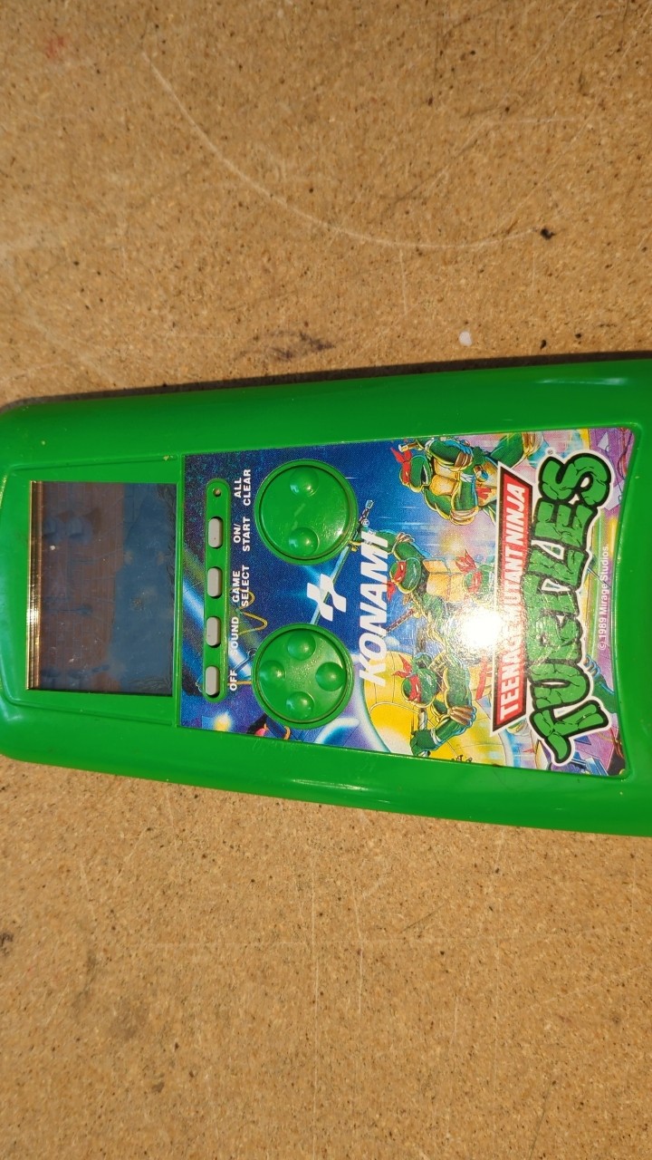 Konami Teenage Mutant Ninja Turtles Handheld LCD Electronic Game 1991