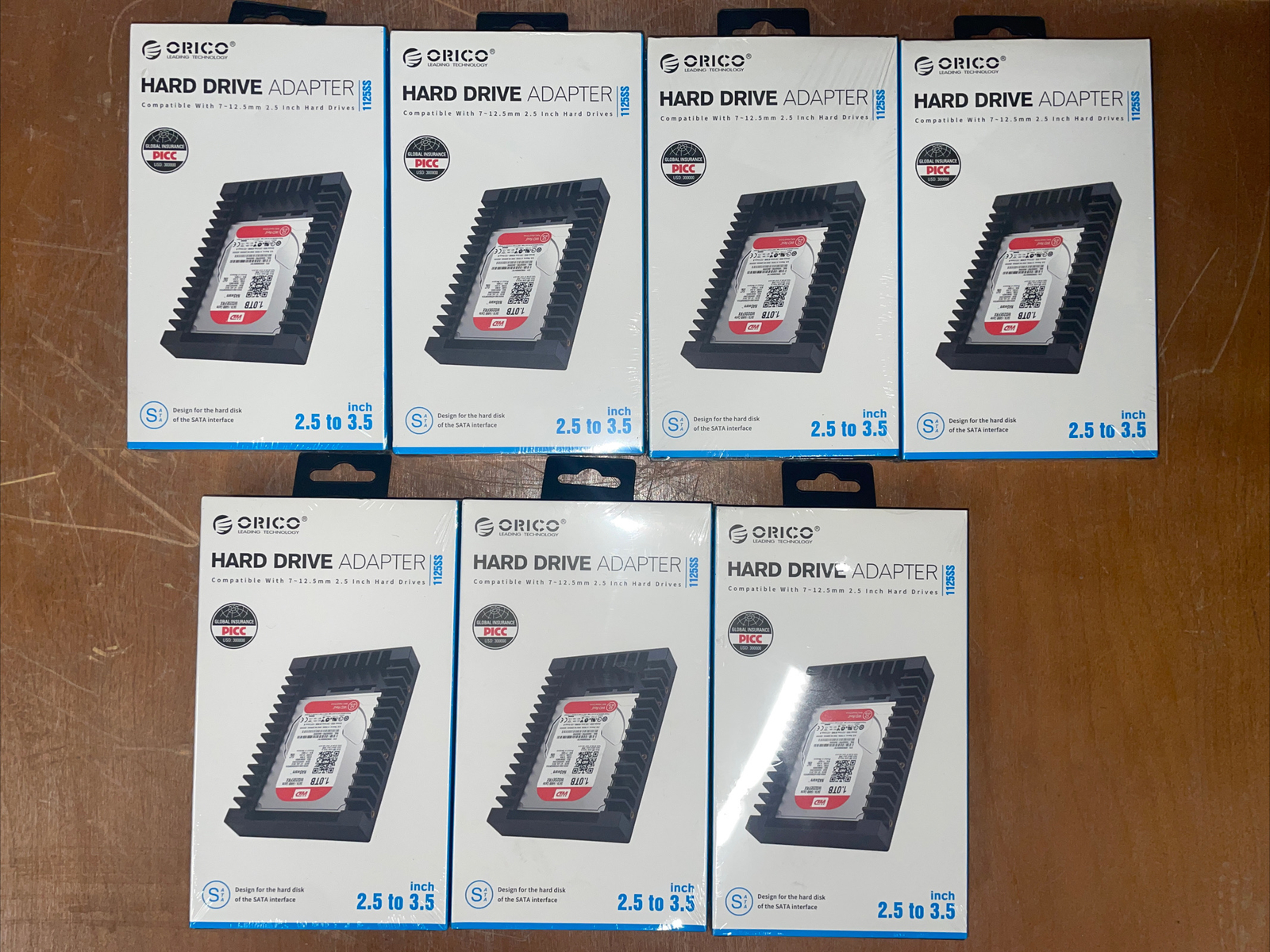 Lot of 7 ORICO SATA 2.5 inch to 3.5 inch Hard Drive adapter 1125s