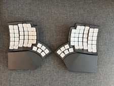 MoErgo Glove80 Rev 2 Plum Blossom 45gf Silent + Case & Apple Keycaps picture