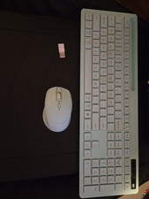 A Light Blue Keyboard An Mouse picture