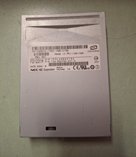 NEC FD1231M 134-506790-441-4 FLOPPY DRIVE - BLACK BEZEL NO FACE PLATE picture