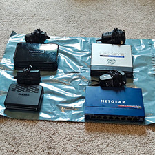Lot Of Four (4) Gigabit Unmanaged Network Switches; Used - see description picture