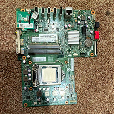 Lenovo m800z aio working motherboard includes wifi card, ram, and processor. picture
