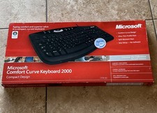 NEW SEALED Microsoft Comfort Curve Keyboard 2000 Wired USB Ergonomic Compact picture