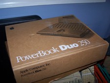 Macintosh PowerBook Duo 250 M7771 in original box, working picture