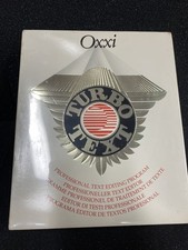 SUPER RARE OXXI TURBO TEXT FOR THE COMMODORE AMIGA. SEALED. VINTAGE picture