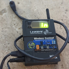 PS2 Linksys wifi adapter with PS2 network adapter startup disc picture