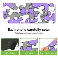 A Large Mouse Pad Featuring a Purple And Gray Abstract Design, Made of Rubber picture