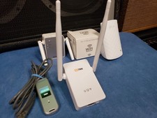 lot of wifi extenders Setek, Linksys, Netgear, tp link, wifi 4 picture