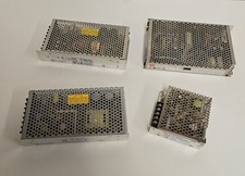 LOT OF 4 MEANWELL POWER SUPPLIES S-25-24, S-150-24, RD-125-1224, S-100F-24. picture