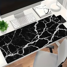 A Large Black And White Marbled Gaming Mouse Pad with a Decorative Pattern, Pe picture