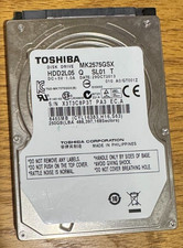 MK2575GSX, A0/GT001z, HDD2L05 Q SL01 T, Toshiba 250GB SATA 2.5 Hard Drive picture