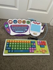 Crayola Computer Keyboard  and Fisher-Price Fun-2-Learn Cool School Computer Toy picture