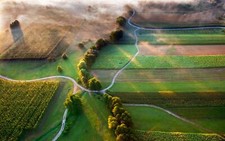 Landscape mist field aerial view slovenia farm road Custom Gaming Mat Desk picture
