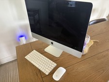 Apple iMac Retina 4K 21.5-inch (Late 2015) with Apple Keyboard and Magic Mouse picture