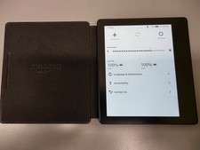 Kindle Oasis 8th Gen 2016 E-paper Reader + Walnut Leather Charging Cover Bundle picture