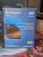 WD My Passport Ultra 500 GB Portable Hard Drive. Open Box with data cable inside picture