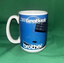 PERSONAL DIGITAL GEOBOOK NOTEBOOK COFFEE MUG BROTHER, VINTAGE 12 OZ. picture