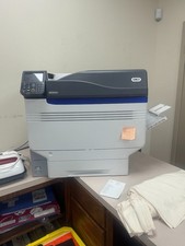 oki white toner printer w/ all ink refills, and A & B Papers + RIP software picture