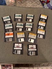 vintage Macintosh software on 3.5-inch floppy disks, Adobe Photoshop 3.0, Norton picture