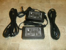 Pair of New FPS Group 12V power supplies with 4 pin round plug picture