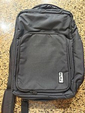 TravisMathew 1st class Lateral convertible Laptop  backpack. palm tree logo picture